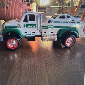Green and White Toy Truck with Car
